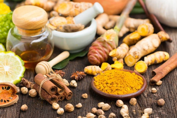 Ayurvedic herbs, turmeric, honey, and spices used in Ayurvedic diet consultation